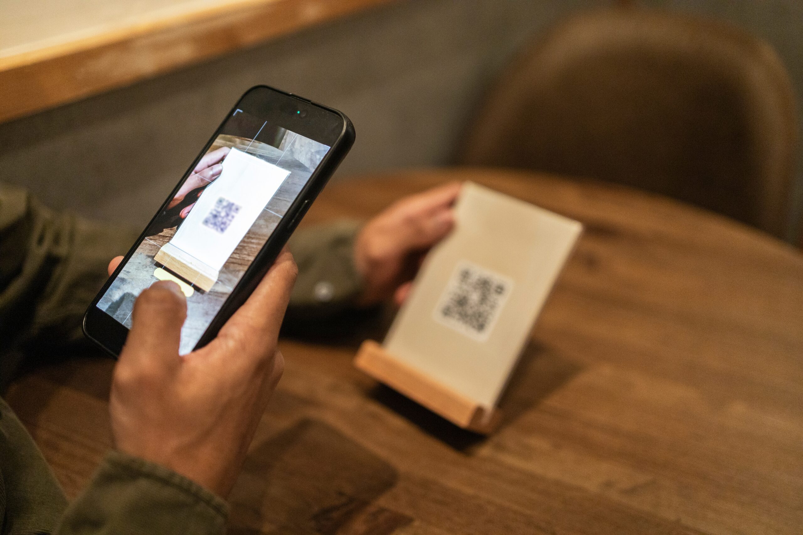 man scanning qr code