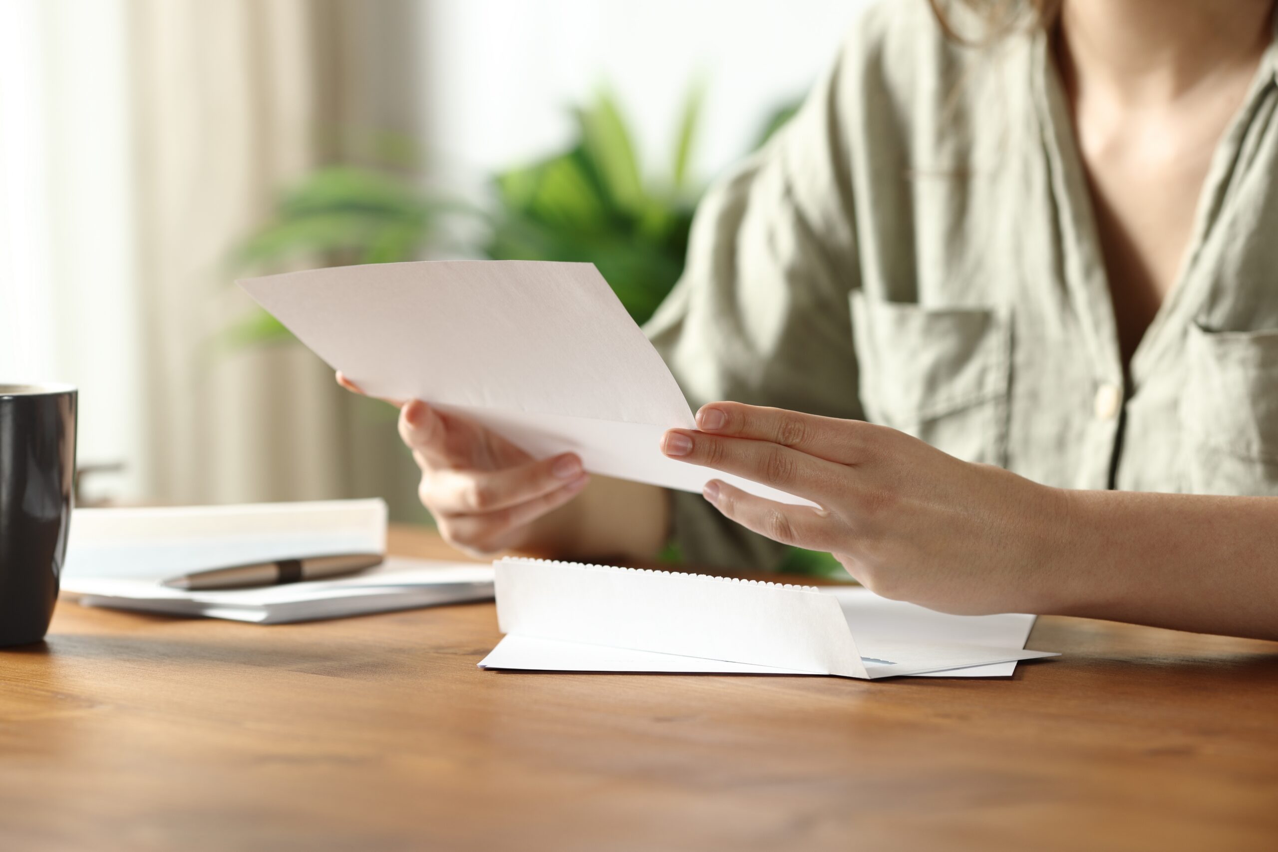 woman looking at mail