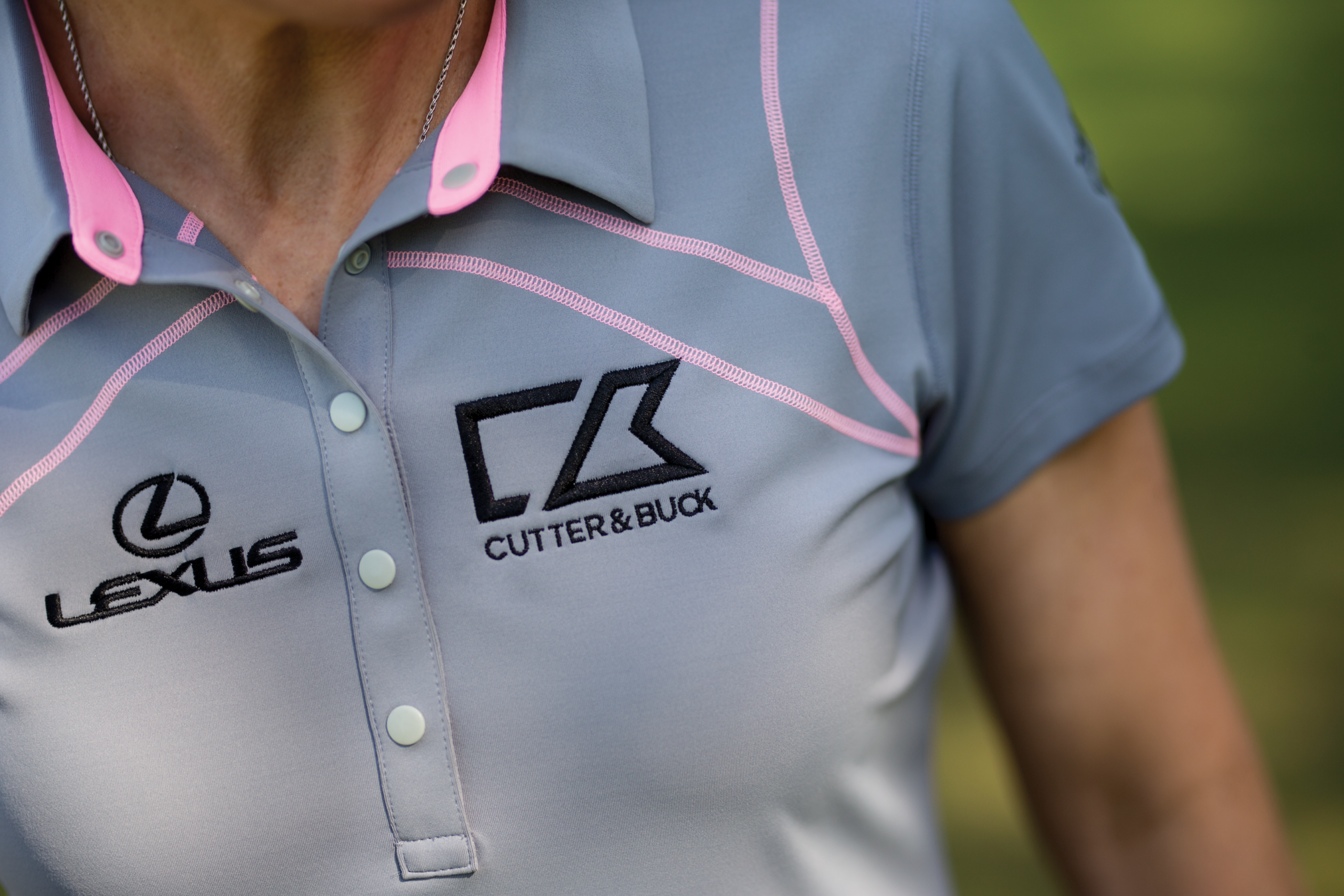 Person wearing a Cutter Buck Polo Shirt