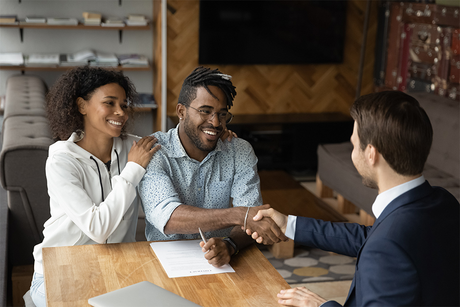 Business man with young couple