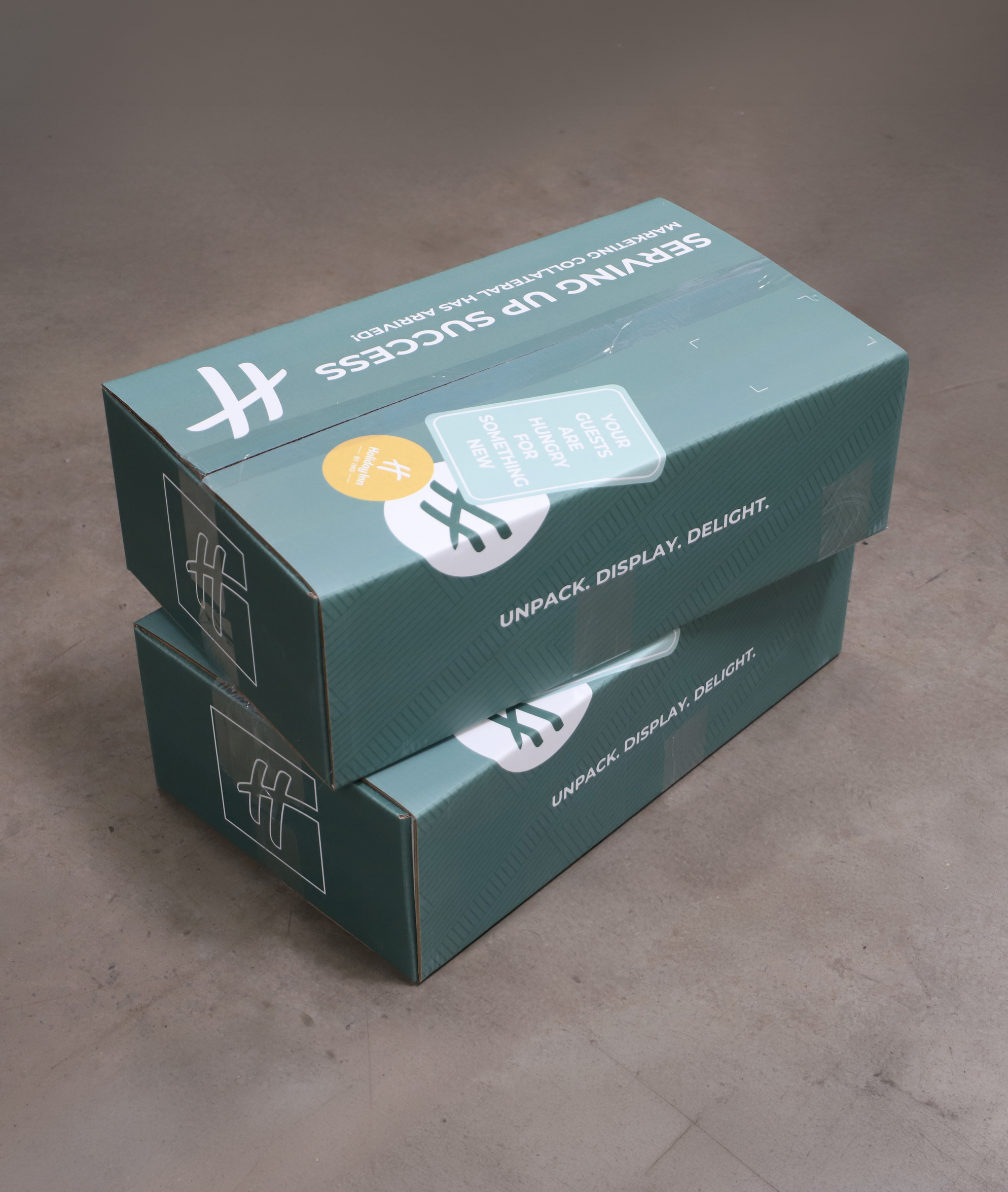 Holiday Inn designed shipping boxes stacked on each other