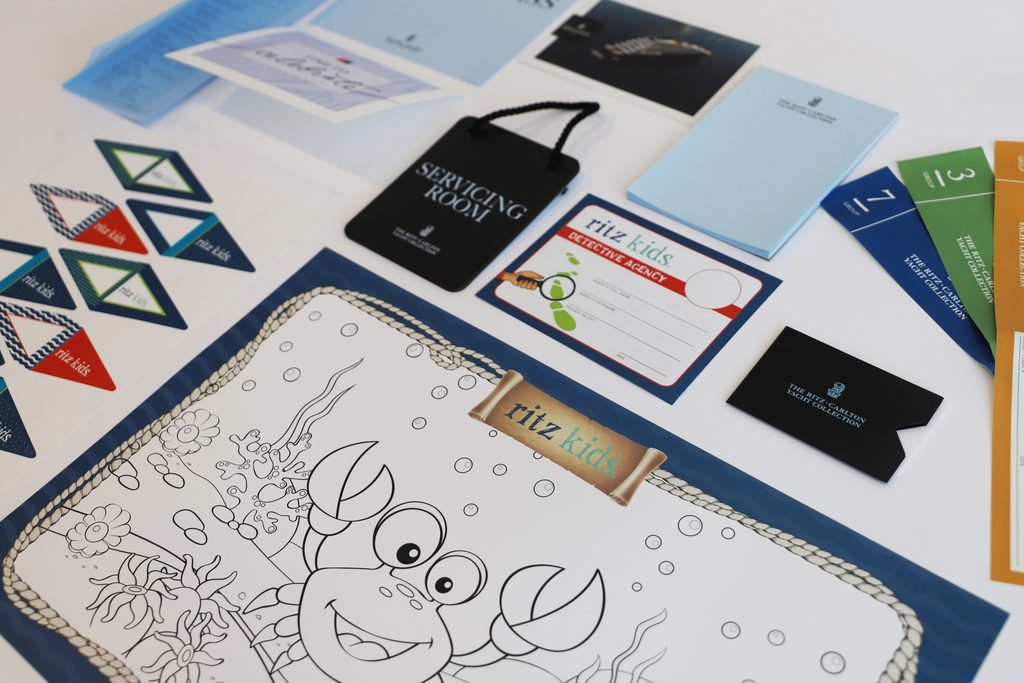 The Ritz Carlton Kids Collateral laid out on table