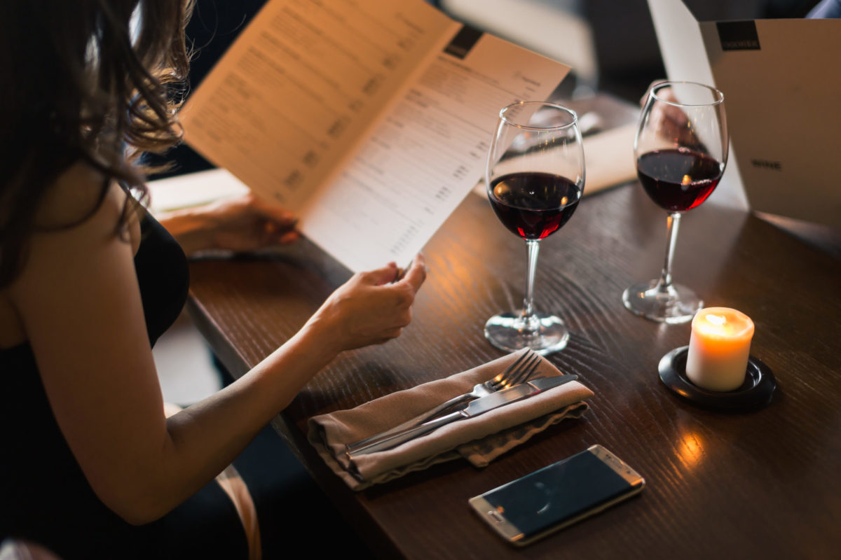 Cheerful,Couple,With,Menu