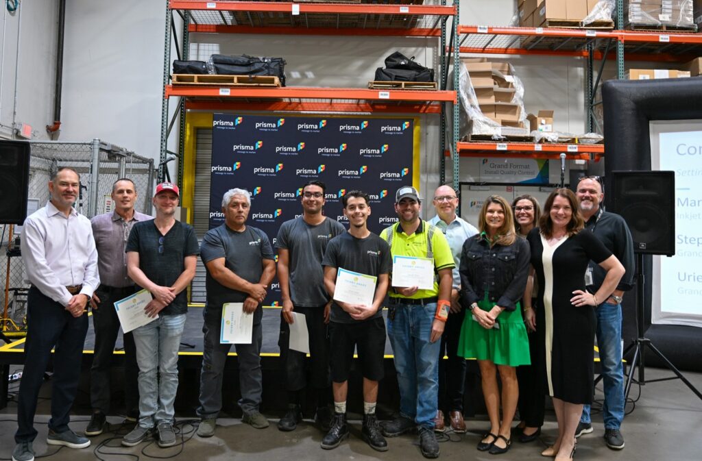 Prisma townhall Prismy award winners with leadership